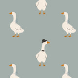 A group of white geese with orange beaks and feet, some wearing black hats and bow ties, arranged in a grid-like pattern against a light blue background.