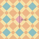 The image is a colorful geometric pattern with a pink diamond in the center, surrounded by a variety of other diamond shapes in shades of green, yellow, and orange. The image is described as a "collage of multiple images" and includes the text "smitten cotton" and "35 cm" in the image.