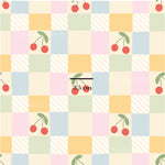 a pattern with cherries on a checkered background