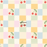 a pattern with cherries on a checkered background