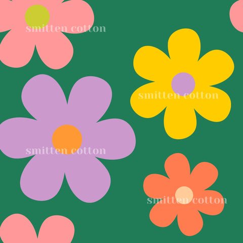 four large, stylized flowers in various colors including pink, purple, yellow, and orange against a green background.