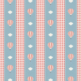 a repeating pattern of red and white striped hot air balloons and white clouds against a blue background.