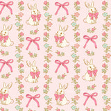 a repeating pattern of pink rabbits with bows and flowers on a pink background.