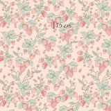 a pink background with green leaves and strawberries