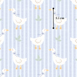 a repeating pattern of white ducks with blue bows on their necks, set against a blue striped background.