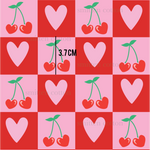 a pattern of cherries on a pink background