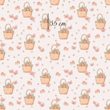 a pattern with a basket of flowers on a pink background