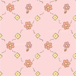 a pink background with a flower pattern on it