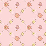 a pink background with a flower pattern on it