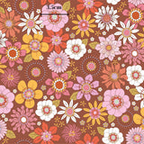 The image is a vibrant and colorful pattern featuring various types of flowers in shades of pink, orange, yellow, and white. The flowers are arranged in a visually appealing manner, creating a lively and cheerful atmosphere.