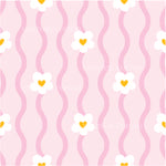 a pink and yellow pattern with hearts
