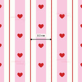 a repeating pattern of pink and white stripes with red hearts. The pattern is composed of vertical stripes and horizontal stripes, creating a visually appealing and symmetrical design. The image is approximately 2.5 cm in width.