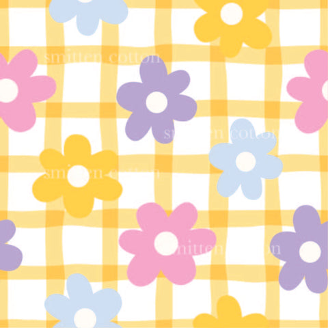 a checkered pattern with flowers on it