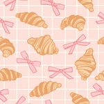 a pattern of croissants with pink bows