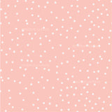 a pink background with white polka dots