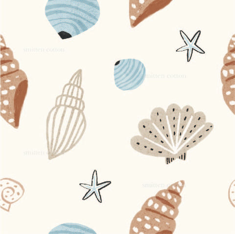 a pattern of seashells and starfish on a white background