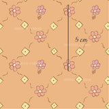 a pink flower pattern with the letter b on it