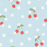 a repeating pattern of red cherries and white flowers against a light blue background.