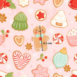 a variety of festive and holiday-themed cookies and candies, including gingerbread cookies, cookies with candy canes, and other seasonal treats. The cookies are arranged in a repeating pattern, creating a visually appealing and colorful display.