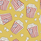 a lot of popcorn on a yellow background