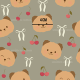 a pattern with a bear and cherries on a gray background