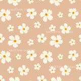 a repeating pattern of white flowers with yellow centers against a light peach background.