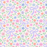 The image is a seamless pattern featuring various flowers and leaves, with purple bows scattered throughout. The flowers include pink, blue, orange, and purple blooms, along with green leaves and stems. The bows are placed randomly across the pattern, creating a playful and whimsical design.