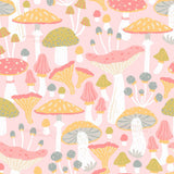 The image is a vibrant and whimsical pattern featuring a variety of colorful mushrooms in shades of pink, yellow, green, and white against a pink background.