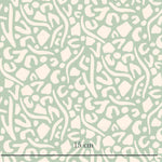 a green and white pattern with a white background