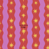 a repeating pattern of yellow stars on a red and purple background, with a measurement line indicating the size of the pattern.