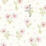 a repeating pattern of pink flowers on a white background, with some text indicating the size of the pattern in centimeters.