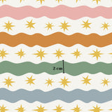 The image is a repeating pattern of wavy lines and yellow stars, with a scale indicating the size of the pattern in centimeters.