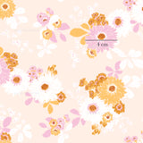 a pink and yellow flower pattern on a white background