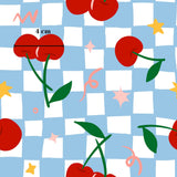 The image is a repeating pattern of red cherries and stars on a blue and white checkered background.