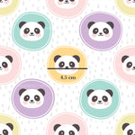 a panda bear pattern with a ruler in front of it