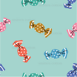 a pattern of bows on a blue background