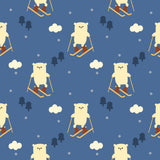 a repeating pattern of cartoon-style polar bears skiing on a blue background with clouds and trees.