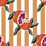 a repeating pattern of orange slices with green leaves against a striped background.