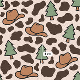 a repeating pattern of brown cowboy hats and green pine trees against a light brown background with brown spots.