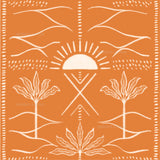 an orange and white print with trees and a sun