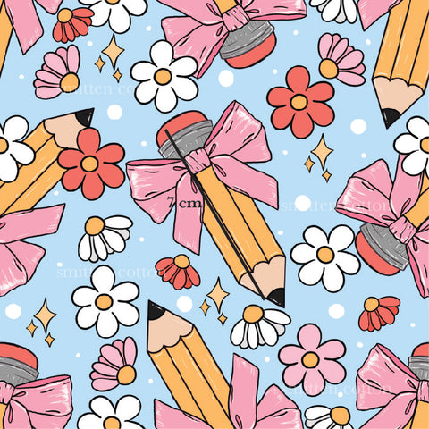 a pattern of pencils and flowers on a blue background