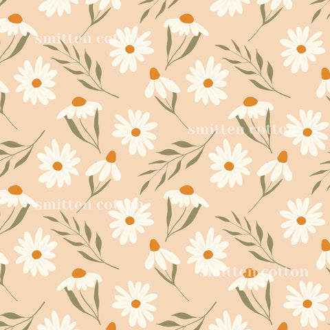 a repeating pattern of white daisies with green leaves against a peach background.