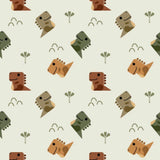 a repeating pattern of stylized dinosaur heads in various colors, including brown, green, and orange, along with small palm tree-like shapes.
