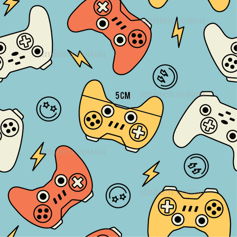 a pattern of video game controllers on a blue background