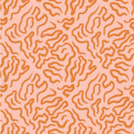 an orange and pink pattern on a pink background