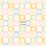 a pattern with flowers on a checkered background