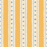 a repeating pattern of vertical stripes in shades of orange and white, with small blue flowers scattered throughout the design.