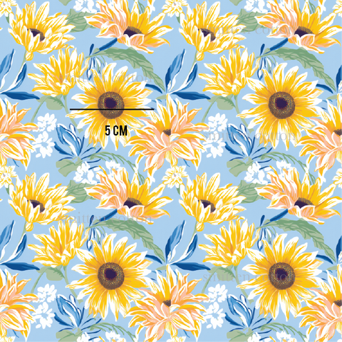 a blue background with yellow and white sunflowers