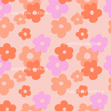 a repeating pattern of various colored flowers, including pink, orange, and purple, against a light pink background.