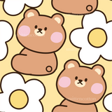 a brown teddy bear sitting next to a flower